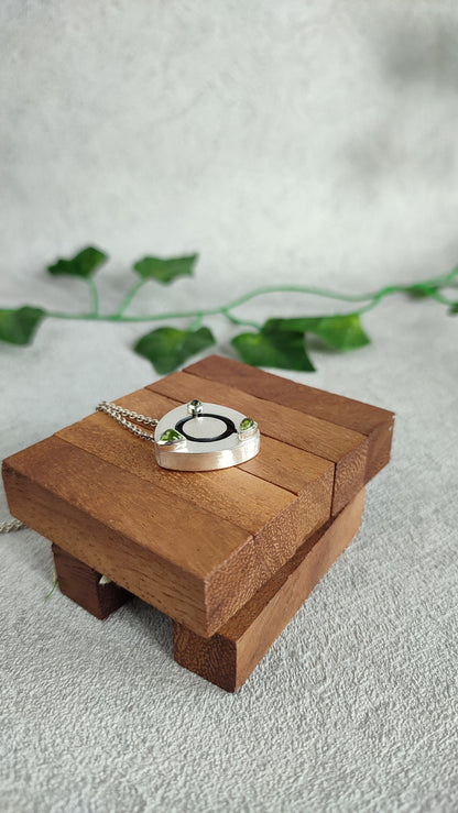 Kinetic Pendant with moving Peridot gemstones - "Sliding Gems"