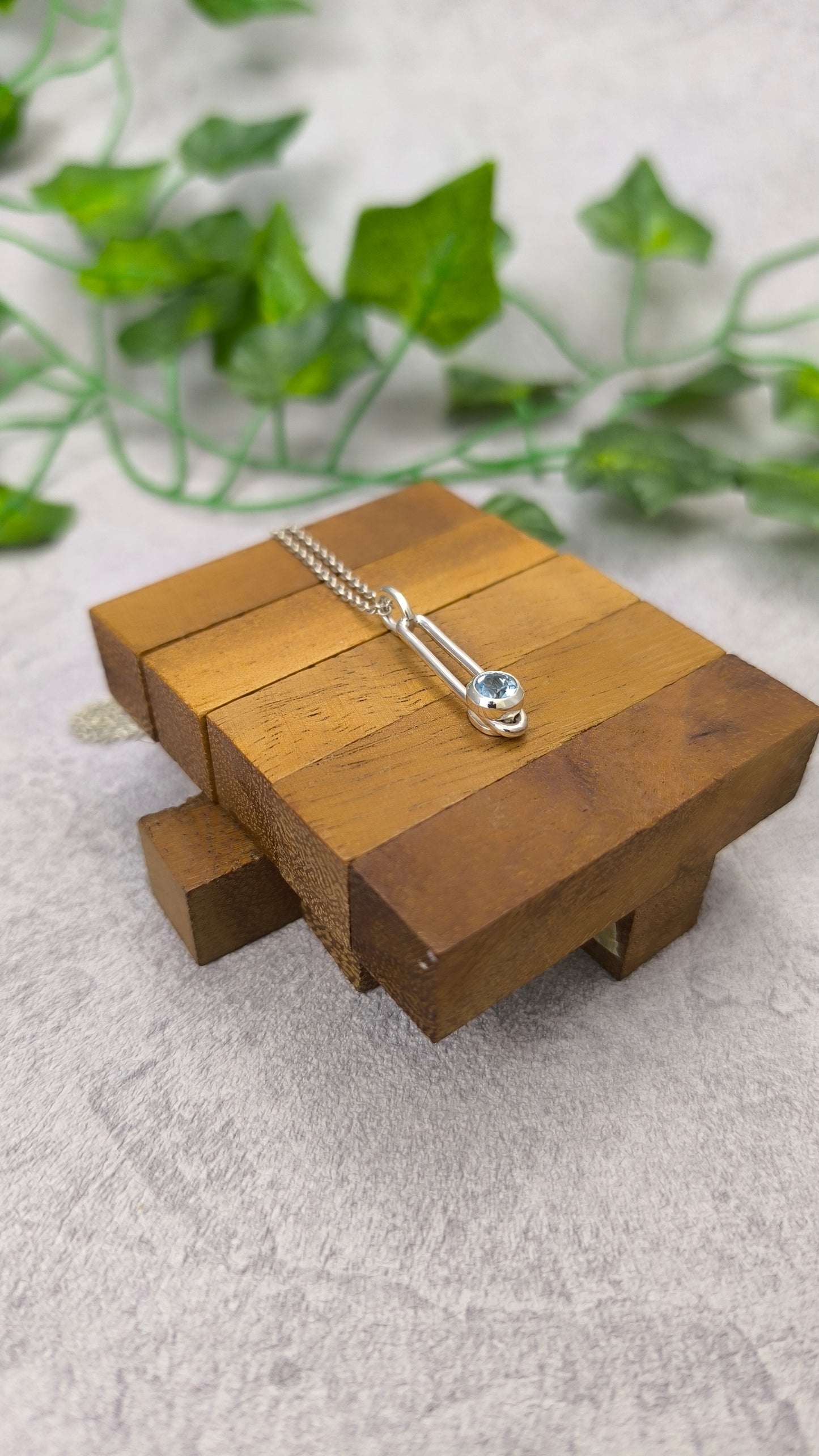 Sliding blue Topaz Pendant