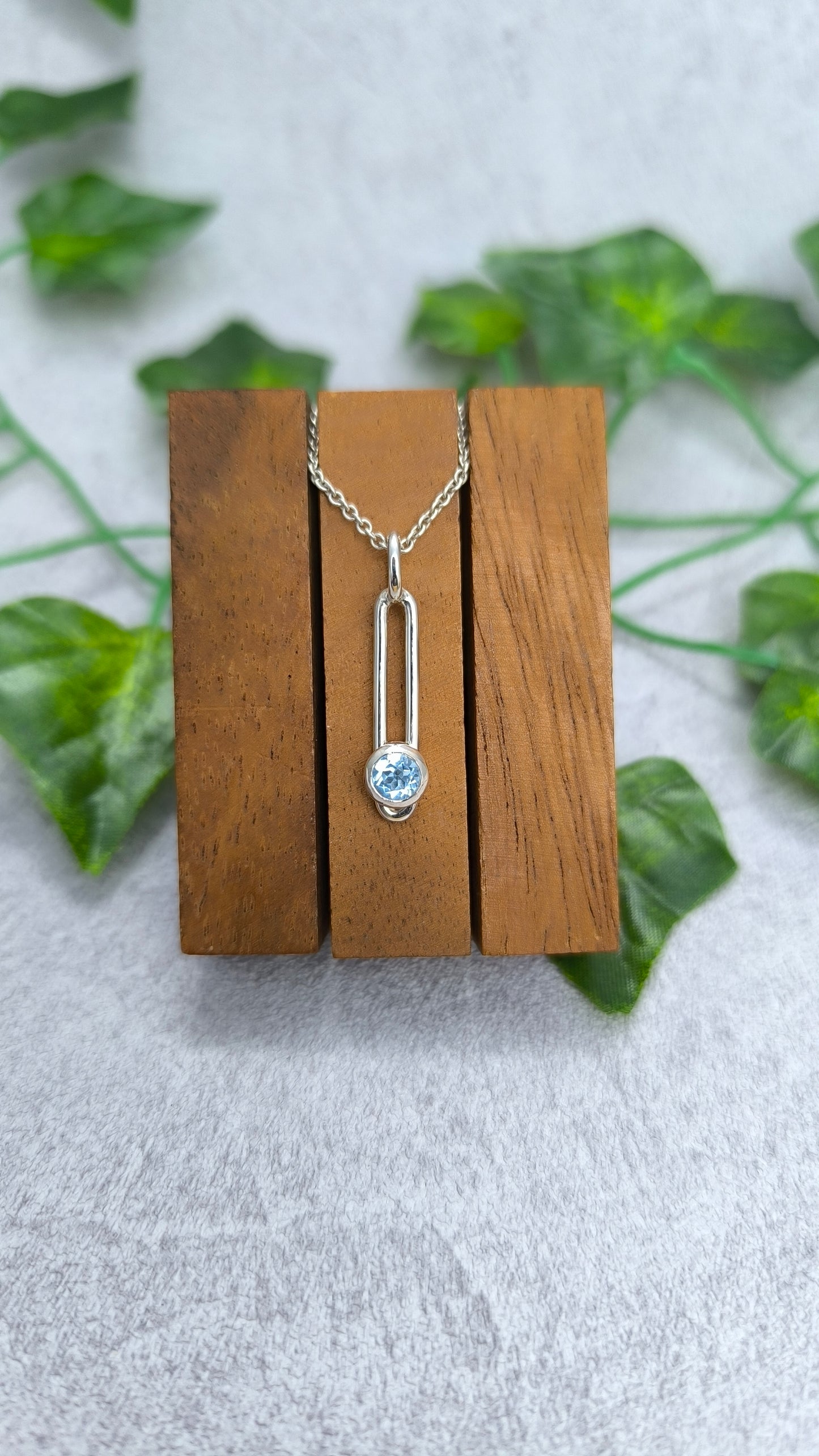 Sliding blue Topaz Pendant