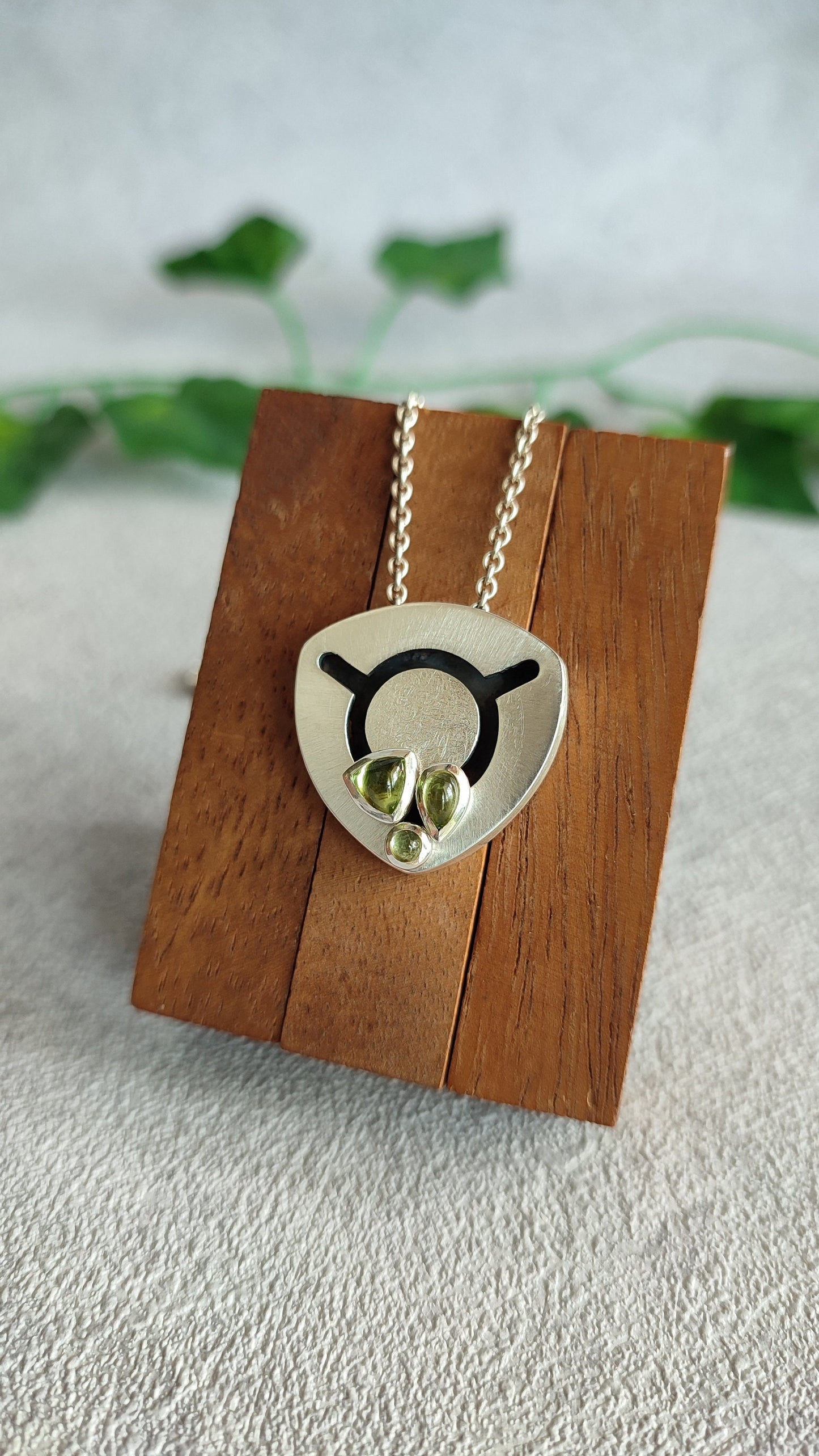 Kinetic Pendant with moving Peridot gemstones - "Sliding Gems"