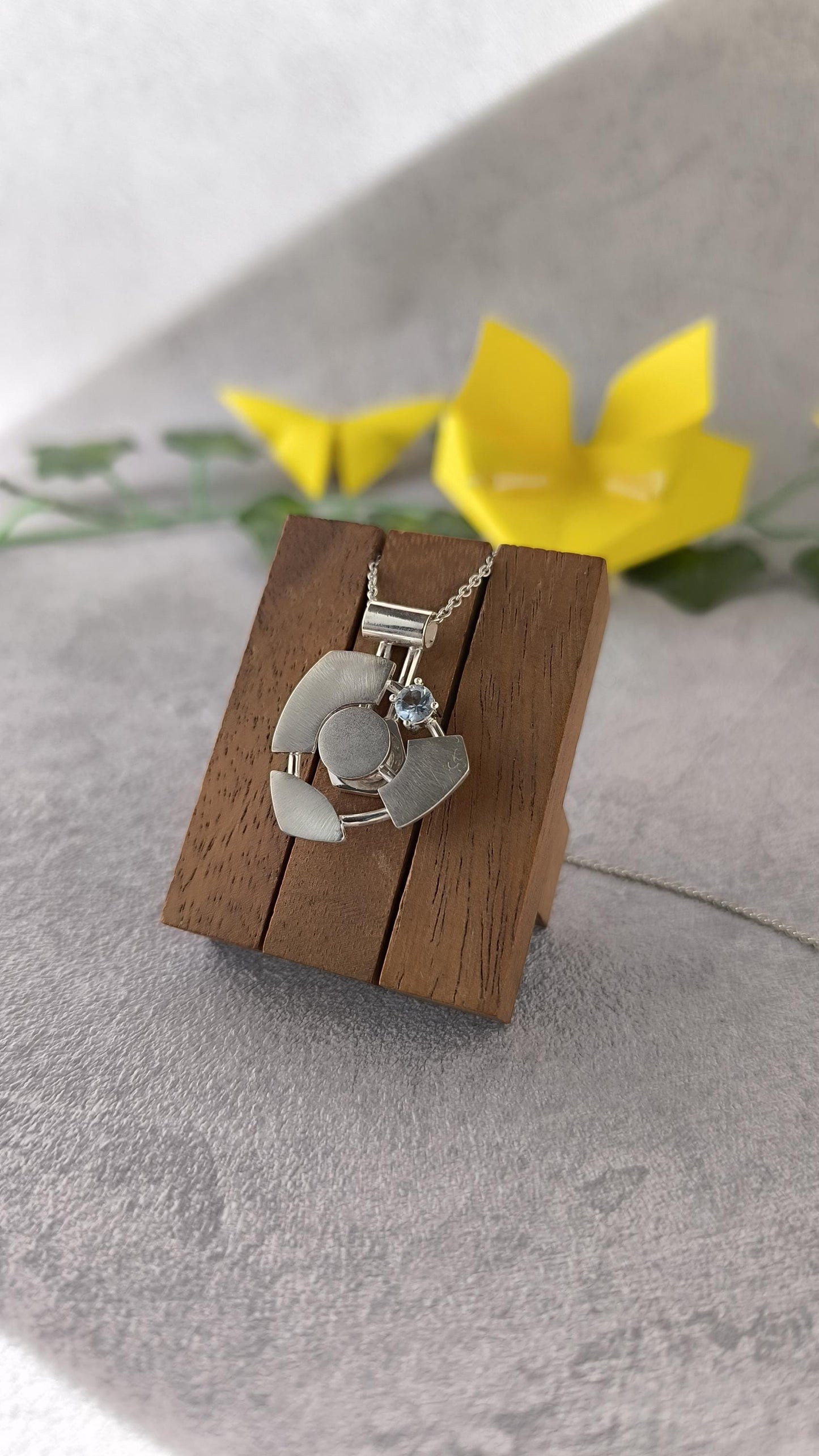 Futuristic spinner Pendant in sterling Silver with Topaz