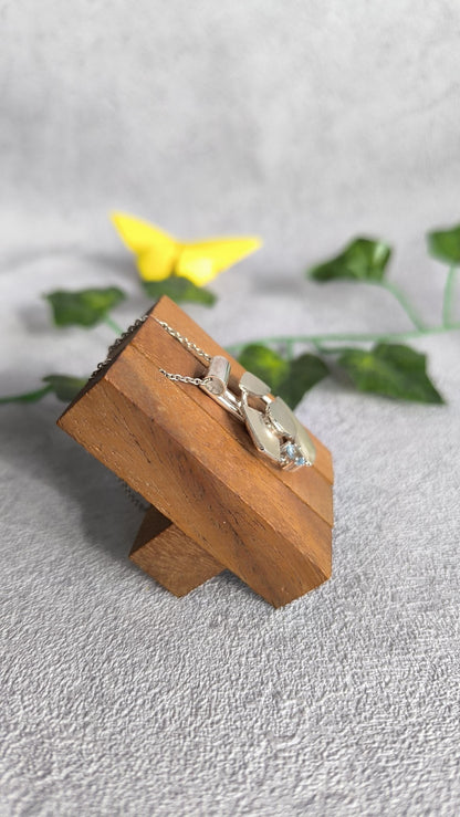 Futuristic spinner Pendant in sterling Silver with Topaz